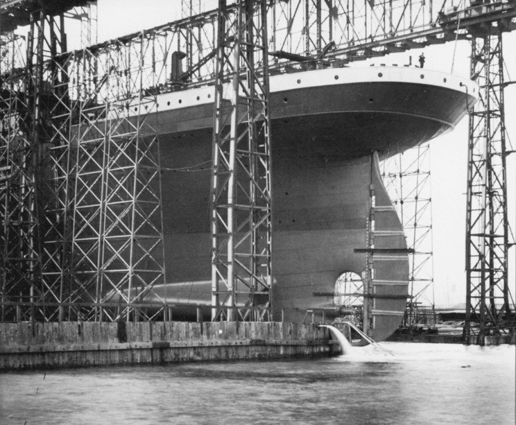 The Titanic sliding to the water